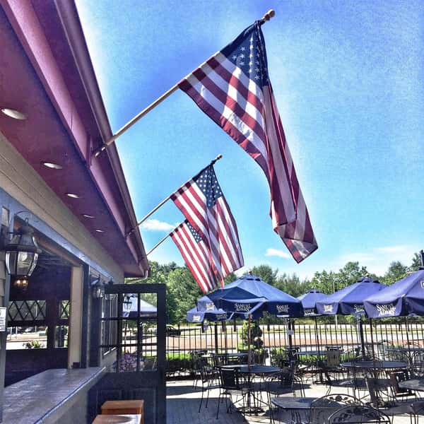 Outdoor patio with american flags