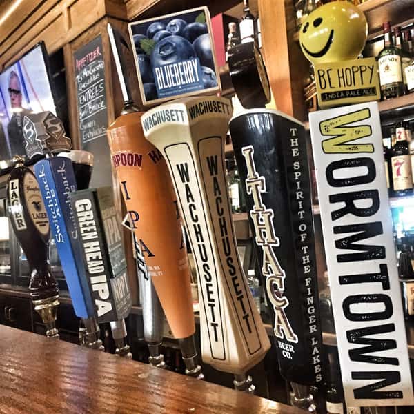 Varitey of taps lined up along bar