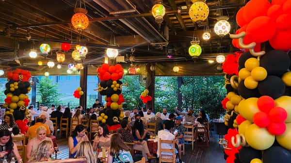 Interior decorated with lots of balloons