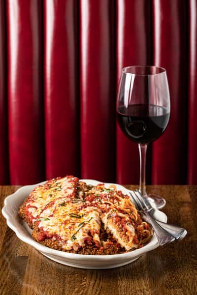 Chicken Parmesan - Served with spaghetti marinara.