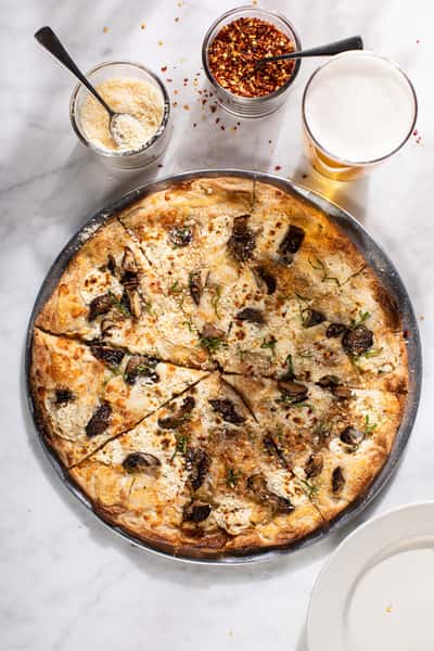 White Pizza - Ricotta, Mushroom & Truffle Oil.