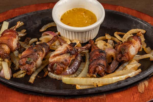 Bacon Wrapped Quail Legs