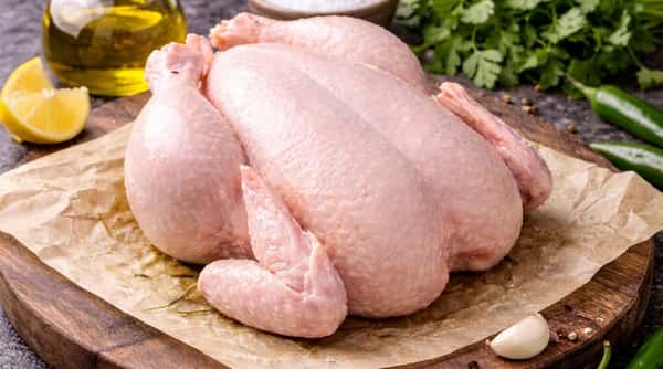 Whole halal chicken prepared fresh by expert butchers at La Carniceria Prime Meat Market