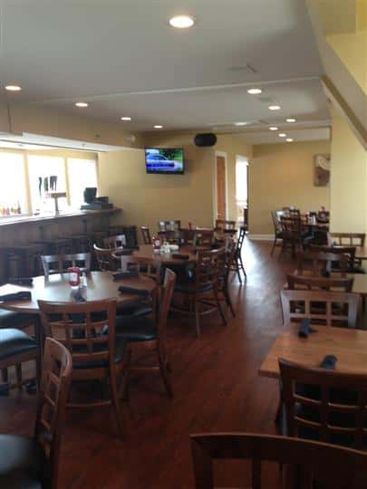 round tables and chairs in the dining room