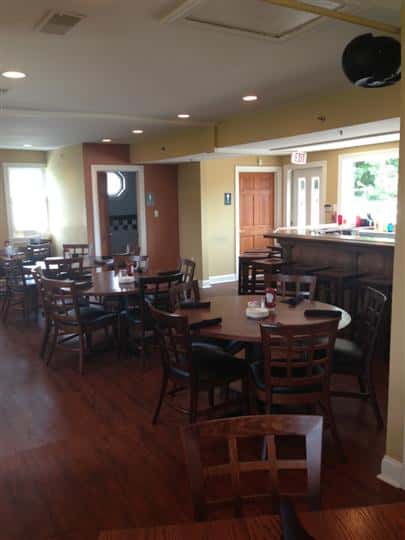 round tables and chairs in the dining room