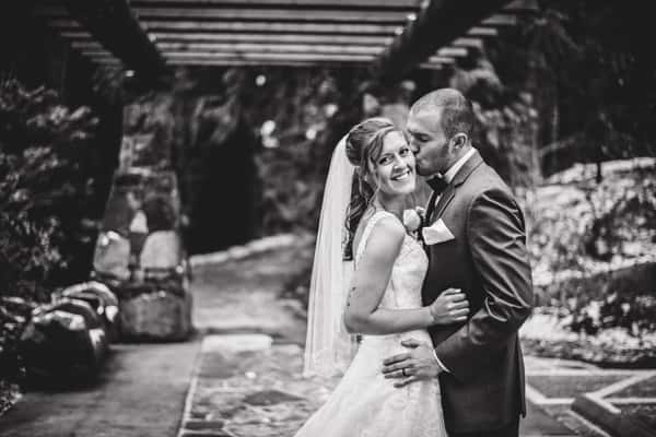 bride and groom in black and white