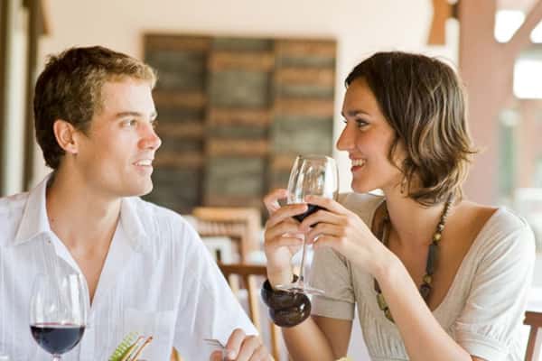 Couple enjoying glasses of wine