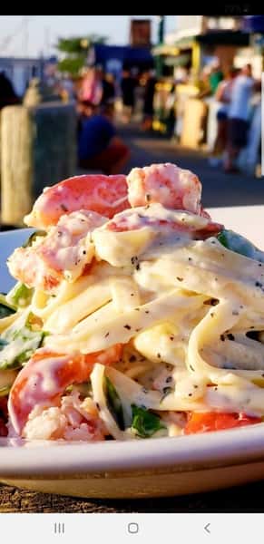 Linguine with cajun alfredo sauce and lobster