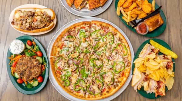 A spread of dishes including a large pizza with green peppers, mushrooms, and red onions, a cheesesteak, shrimp and fries, a burger with salad, a cut sandwich with chips, and a calzone.