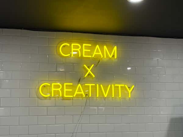 "Cream + Creativity" sign