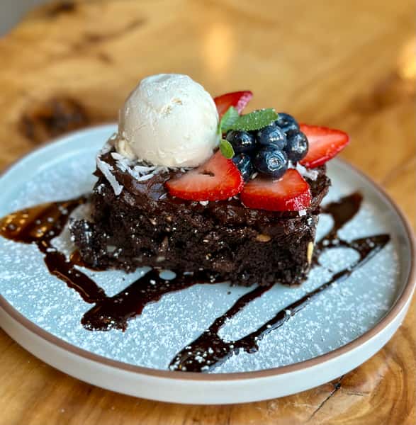 brownie with fruit and ice cream