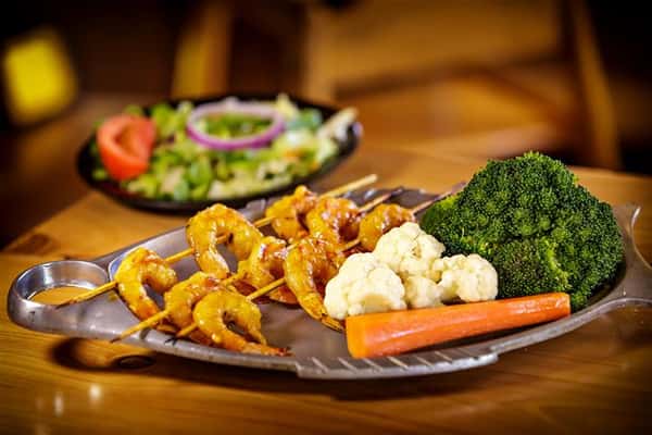 shrimp skewers with roasted vegetables