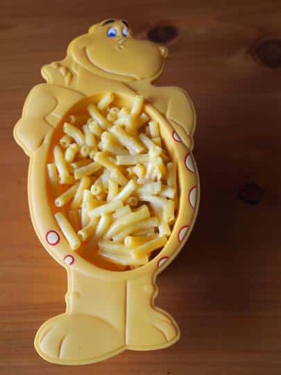 mac and cheese in a kids dinosaur bowl