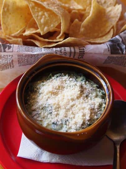 french onion soup topped with grated cheese