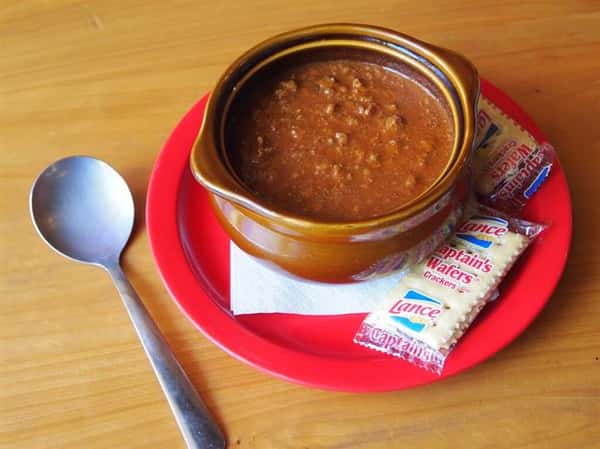 chili in a bowl with crackers