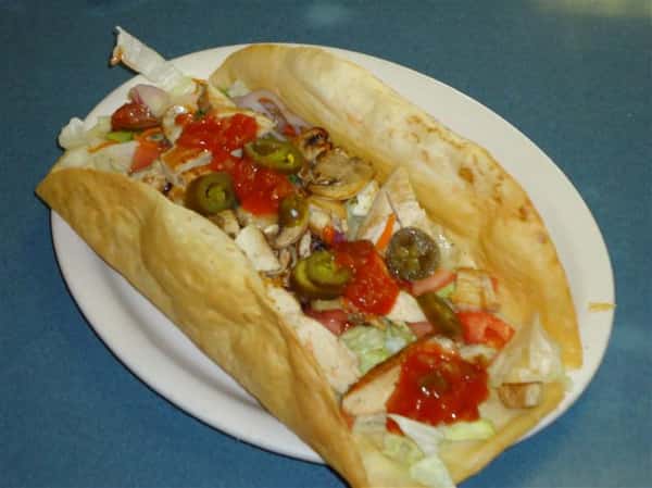 Taco with Jalapenos and salsa