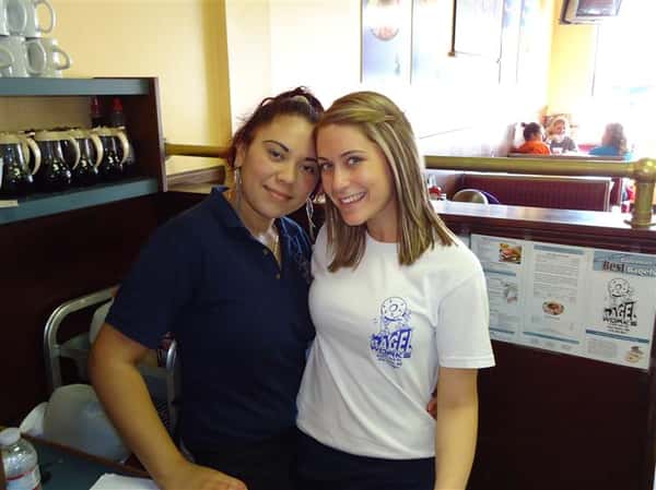 2 staff workers smiling