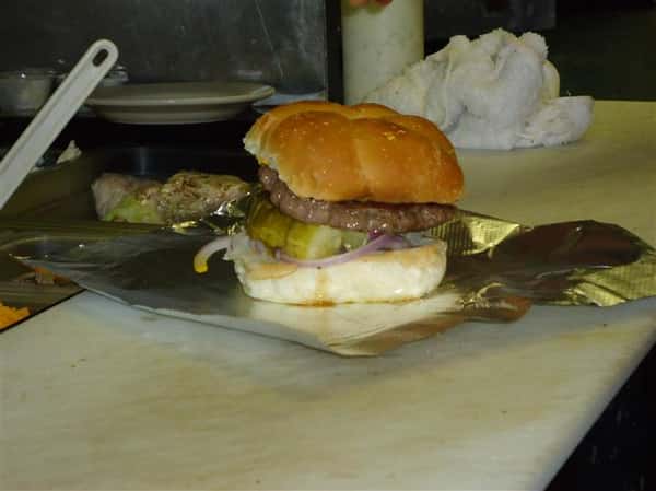 Burger with pickles and onions