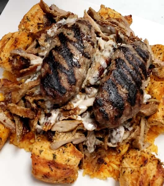 Mixed Grill: 6 chicken skewers , 5 kufta kebab patties, MD shawarma, over rice