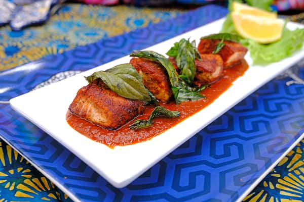 6 oz pan-seared Atlantic salmon with our spicy Oaxacan morita sauce and topped with crispy sweet Thai basil.