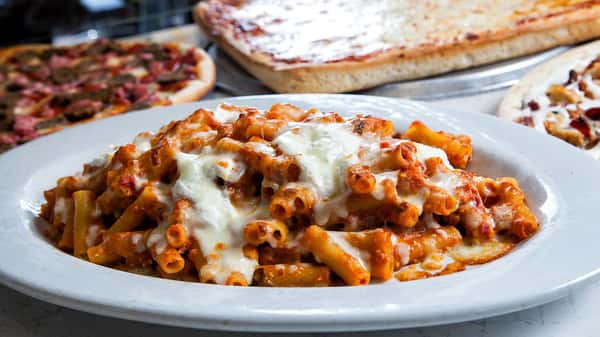 Pasta covered in cheese and sauce