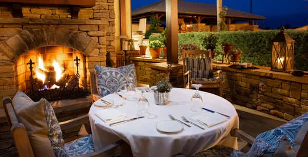 Dining table near a fireplace