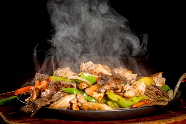 Mixed Fajita: Chicken, beef and shrimp with peppers and onions