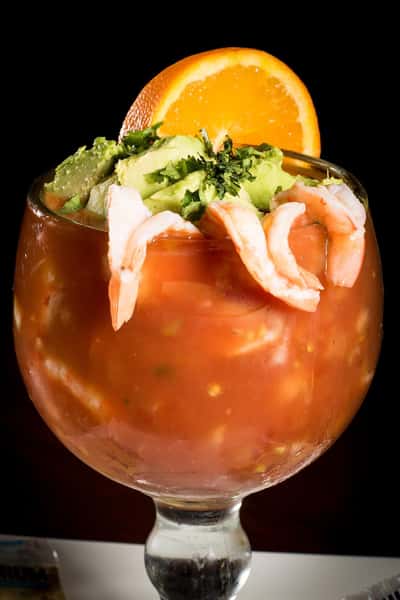 Shrimp Cocktail: Served with homemade cocktail sauce, chopped tomatoes, onions, cilantro and avocado