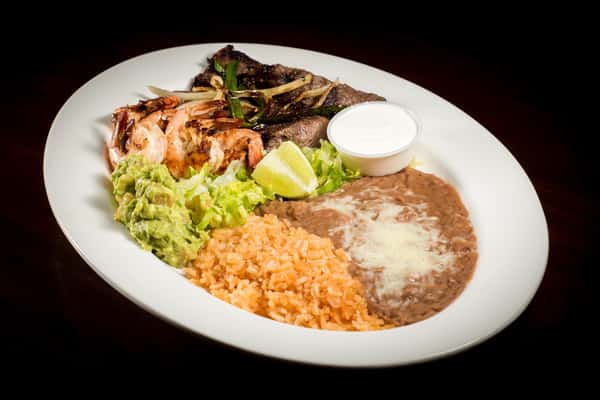 Steak & Shrimps Platillo: Grilled shrimp and grilled thin sliced of steak. Served with guacamole and sour cream