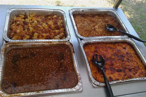 Catering table with multiple food in stoves