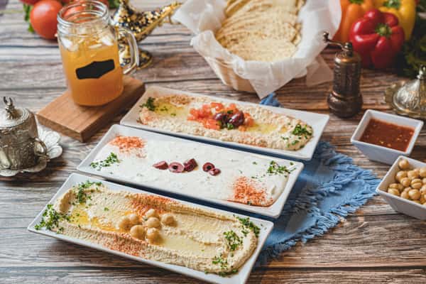 Hummus, tzatziki, and baba ganoush