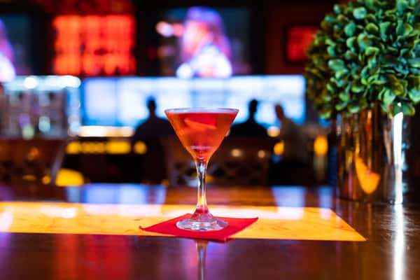 FROM RUSSELL'S WITH LOVE - Coconut Rum and Peach Schnapps shaken with cranberry juice gives a sweet surprise