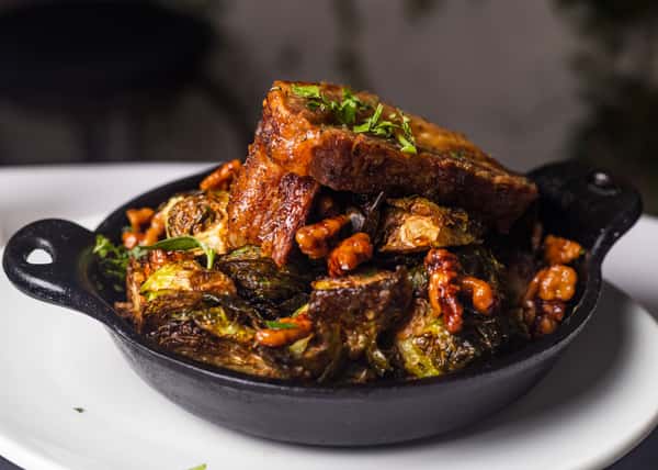 Crispy Kurobuta Pork Belly with Cast Iron Roasted Brussels Sprouts