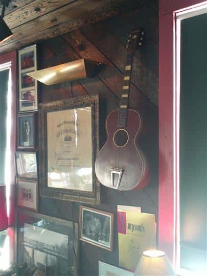 Mounted Guitar and framed programs