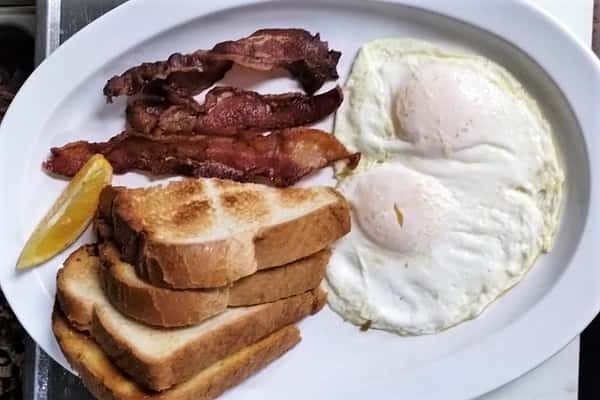 4. 2 Eggs, Toast with Ham, Bacon or Sausage