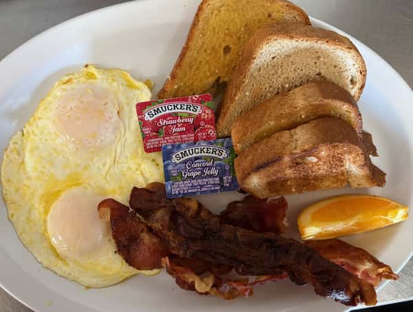 4. 2 Eggs, Toast with Ham, Bacon or Sausage