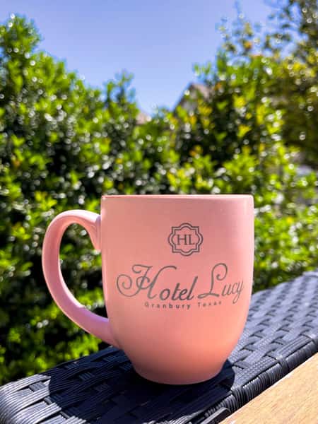 The perfect Hotel Lucy souvenir! We will have a pink bistro coffee mug waiting for you in your room that is yours to take home! This purchase is for a single bistro mug only.