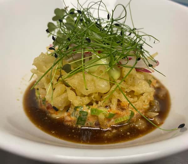 Spicy tuna tartare, avocado wasabi mousse, tempura crunch, radish, micro mizzuna, yuzu ponzu