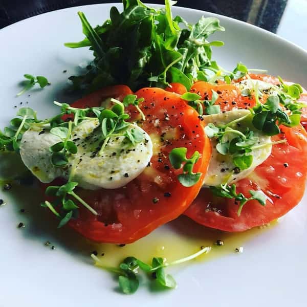 Our house made mozzarella and @sporthillfarm  tomatoes will be making a return later this week