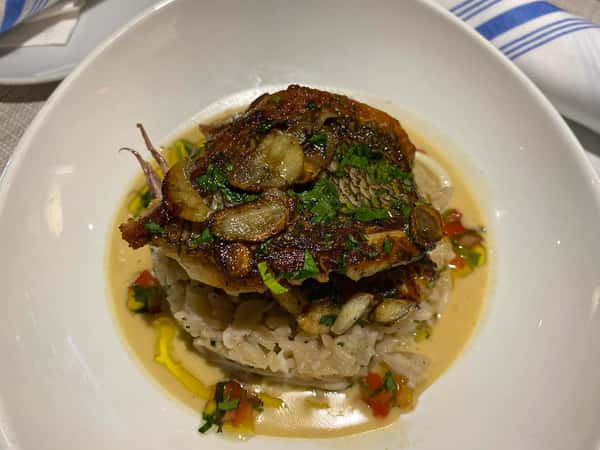 Black Sea bass, Calamari rice pilaf, basil shrimp sauce