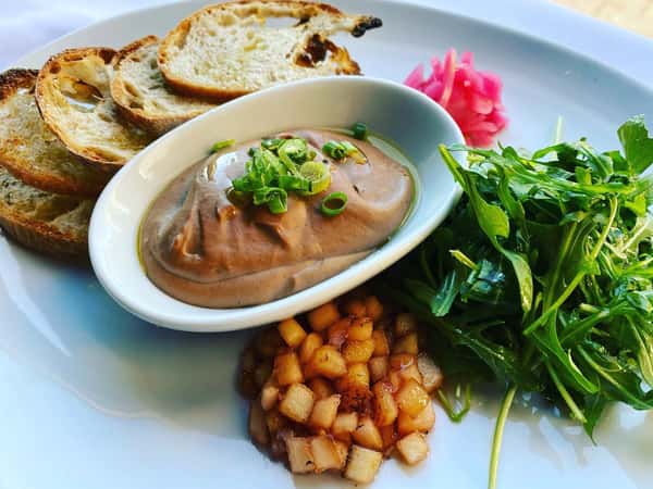 Chicken liver mousse, picked onion, arugula salad, apple and port wine compote, toast points.