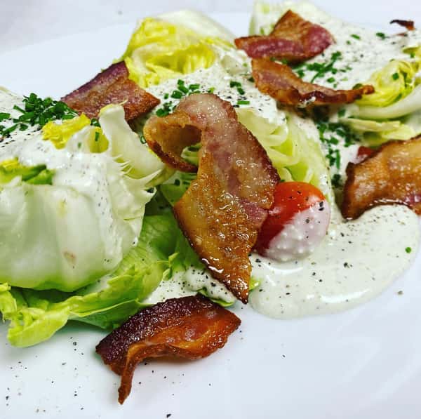 Wedge Salad…smoked bacon, baby iceberg, grape tomato and house made buttermilk blue cheese dressing