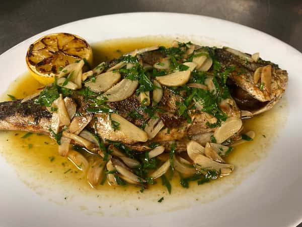 Our whole grilled Dorade is a magnificent treat