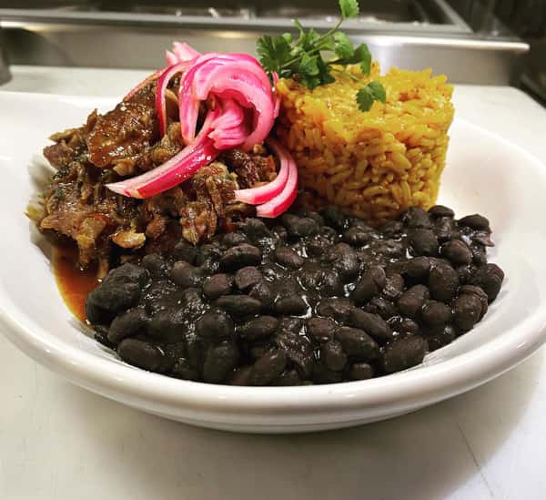 Pernil, adobo rice, traditional black beans, pickled onion