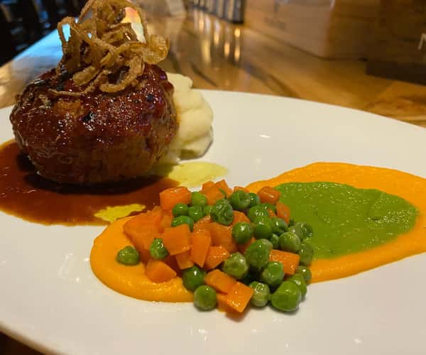 Bourbon glazed Smoked Veal Meatloaf, “peas and carrots” and whipped potatoes