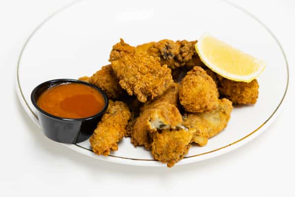 Fried oysters with sauce