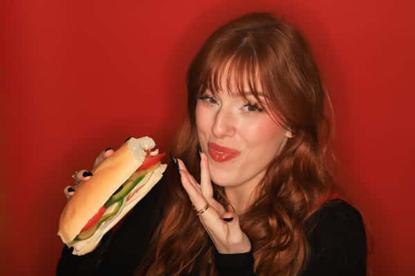Women eating a Moe's Sandwich