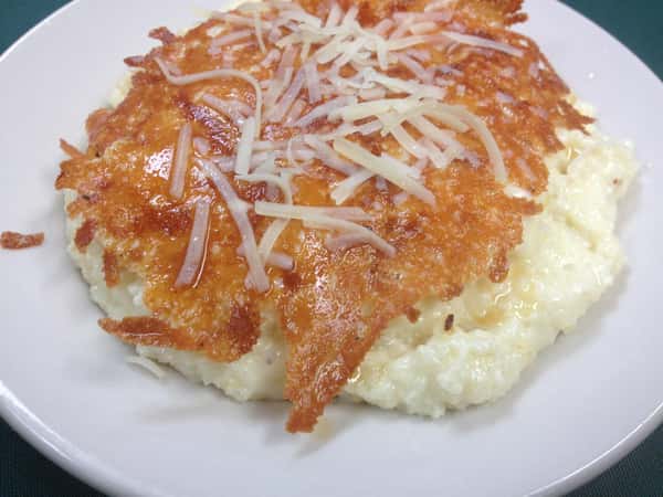 rice pudding with coconut flakes on top
