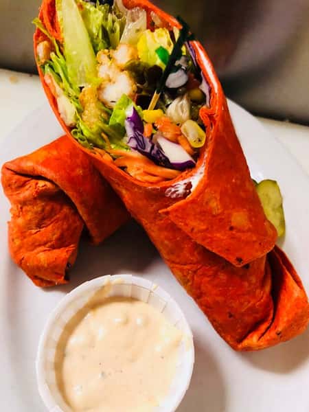 a tomato wrap with vegetables