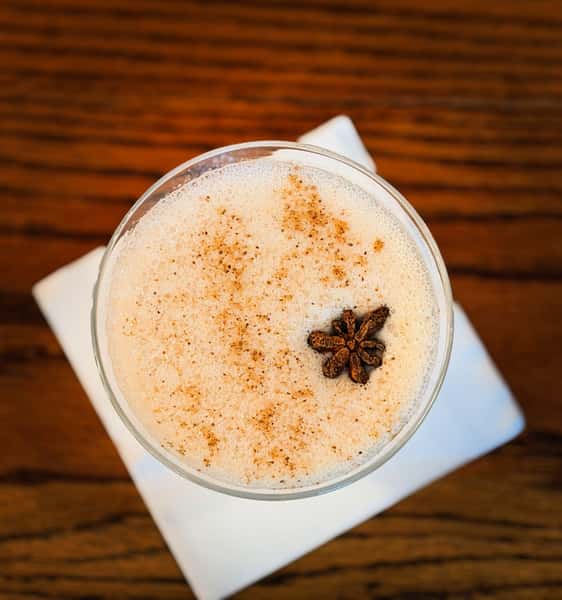 The •SPICED CHAI MARTINI• made with Vanilla Vodka, Captain Morgan, Simple, Cream, and Chai this fall cocktail is sure to get you in the mood for the season! 🍁